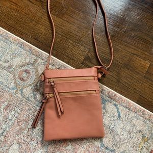 Pinkish brown small cross body bag